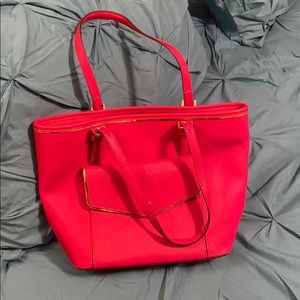 Red and gold Michael Kors Handbag.